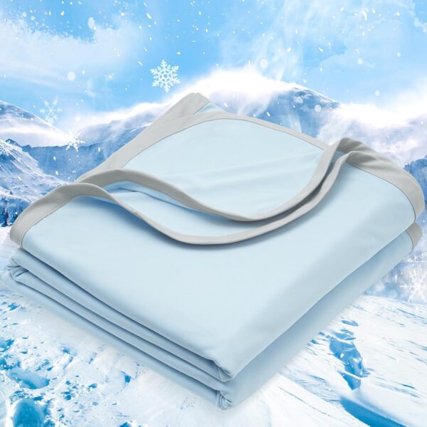 Dual-Action Cooling Blanket — Features cooling fibers and dual-cooling technology; a heat-absorbing summer throw designed to keep you cool all night long and help alleviate night sweats (Ice Blue, 90" x 90").